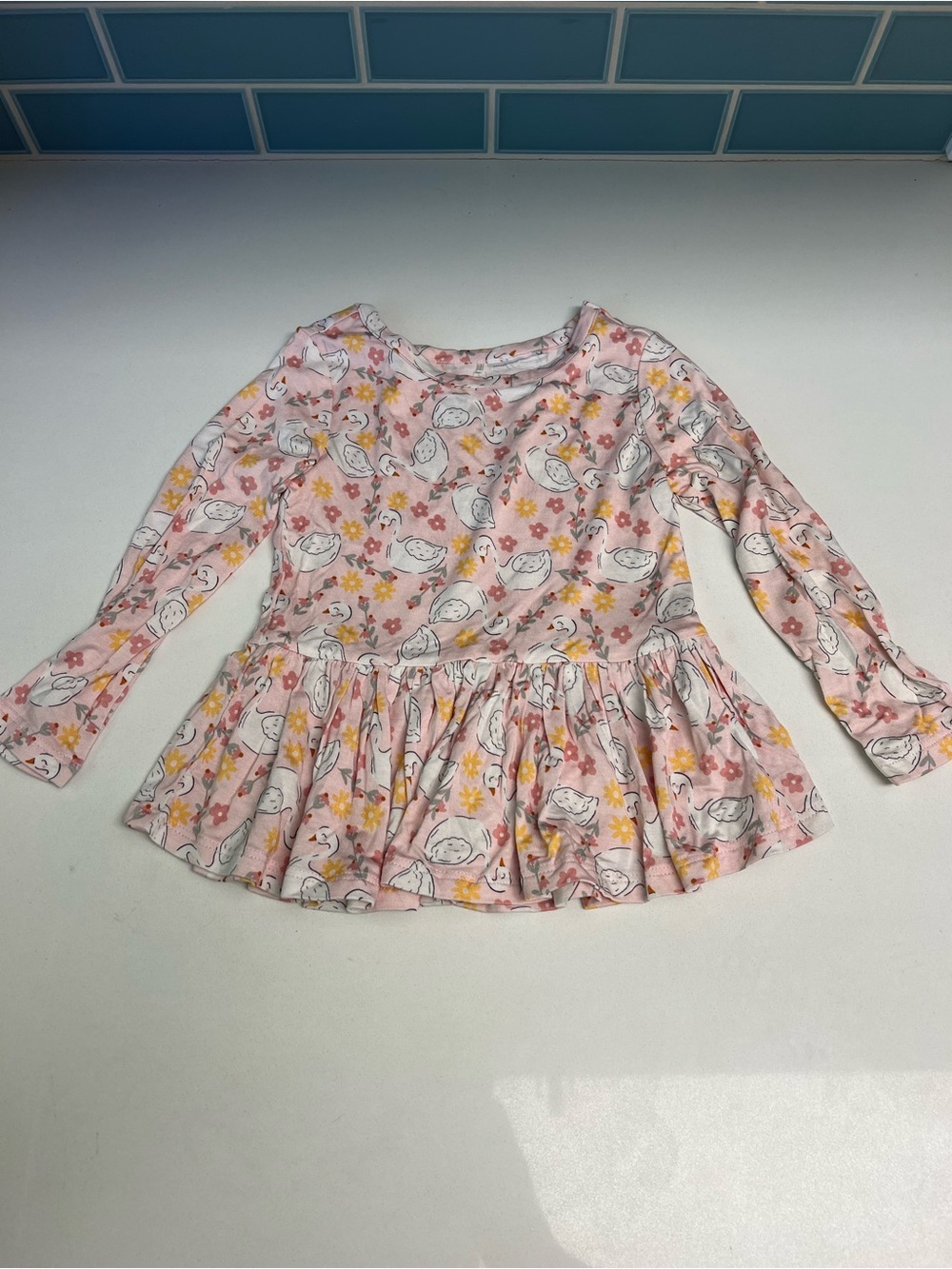 Posh Peanut Pink Long Sleeve Peplum Top with Bird & Floral Print